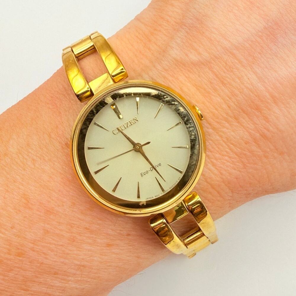 Citizen Eco-Drive Axiom Women's Gold Champagne Dial Watch 28mm EM0638-50P Works
